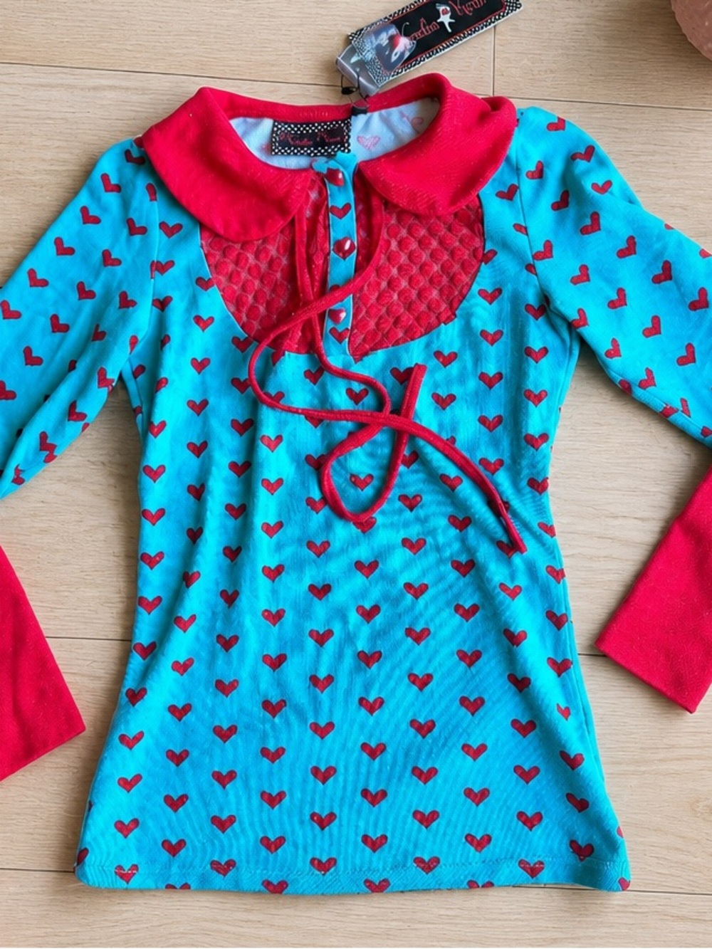 Voodoo Vixen Turquoise Top with Red Heart Pattern